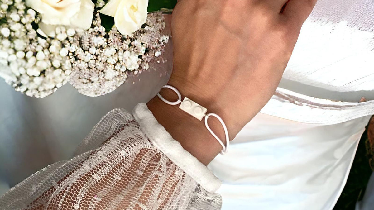 Parure bracelet et bague Brique d'Oreille pour un mariage sur le thème Lego