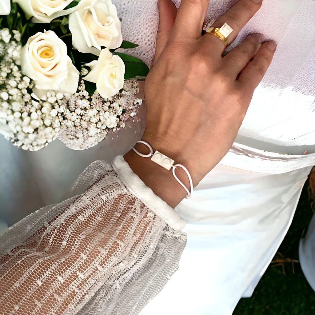 Parure bracelet et bague Brique d'Oreille pour un mariage sur le thème Lego