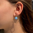 Boucles d'oreilles pendantes colorées avec un Lego bleu pastel