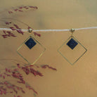 Boucles d'oreilles pendantes colorées avec un Lego bleu marine
